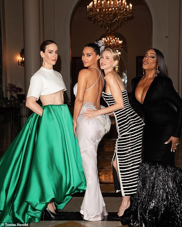 Kim Kardashian continued to brush off the negative reviews for All's Fair on Tuesday, as she shared a slew of snaps larking about with her co-stars at the TV show's premiere in Rio de Janeiro
