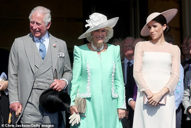 Shortly after they became the Duke and Duchess of Sussex , Prince Harry (not pictured) and Meghan Markle (right) were invited to the Castle of Mey in Caithness by King Charles