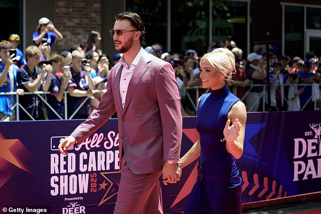 Paul Skenes (pictured with girlfriend Livvy Dunne) has captured his first Cy Young Award