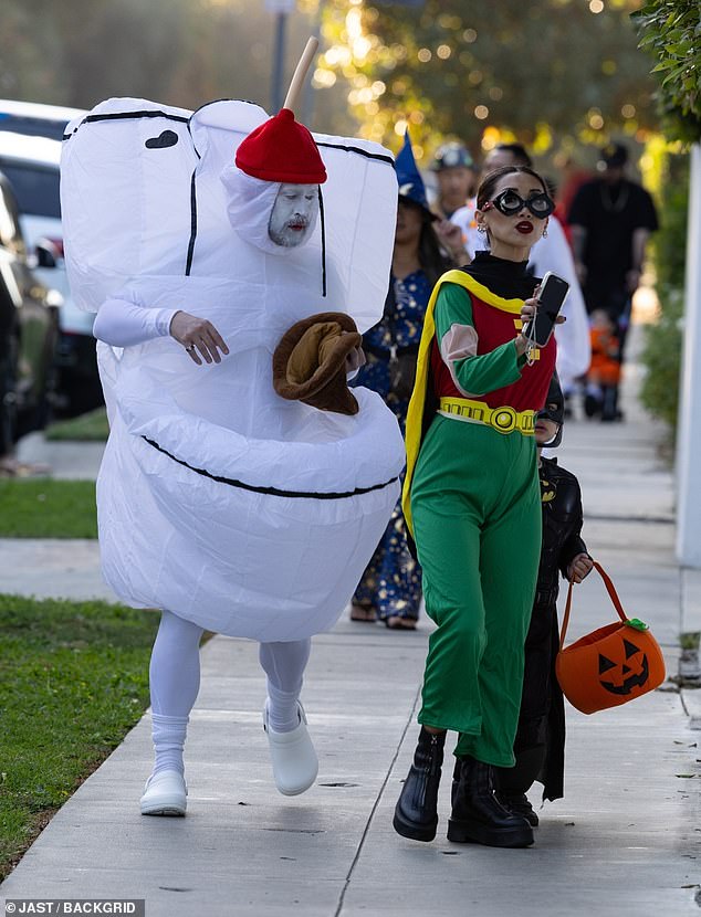 Macaulay Culkin and Brenda Song took their kids trick-or-treating in Los Angeles on Friday evening, with both stars sporting over-the-top ensembles for Halloween