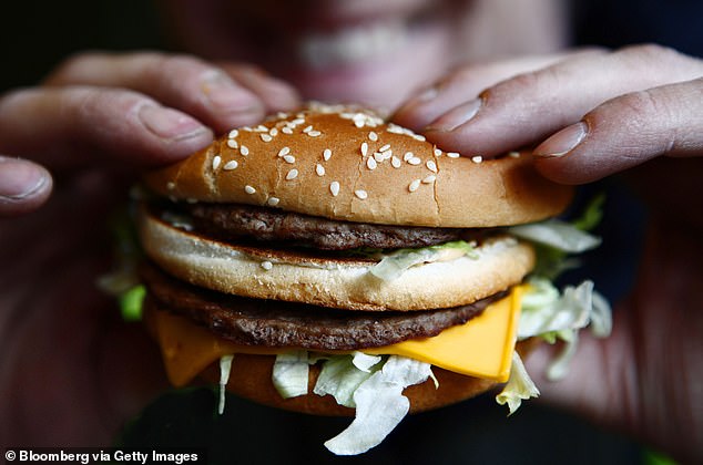 A 22-year-old man is fighting for his life in hospital after he swallowed an entire burger while having a meal with his friends 'for a joke' (file image)