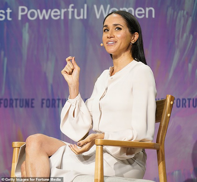 The Duchess of Sussex has set out to become a billionaire, according to royal commentator Emily Andrews (Meghan is pictured onstage during Fortune Most Powerful Women Summit 2025 in Washington DC earlier this month)