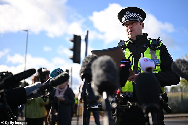 Superintendent John Loveless from British Transport Police speaks to the press at Huntingdon Station on Sunday morning