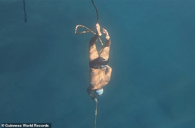 Waldemar Bruderer has set a new world record for holding his breath while diving under ice - without fins or a wetsuit