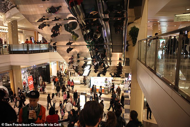 Westfield blamed 'unsafe conditions' for the mall's decline in 2023 (Pictured: Black Friday shoppers in 2011 at the San Francisco mall)