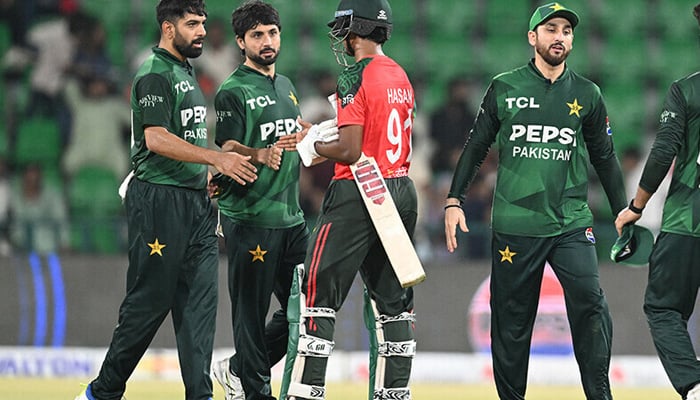 Pakistans players Haris Rauf (L) and Abrar Ahmed (2L) shake hands with Bangladeshs player Hasan Mahmud (C) at the end of the second Twenty20 international cricket match between Pakistan and Bangladesh at the Gaddafi Cricket Stadium in Lahore on May 30, 2025. — AFP