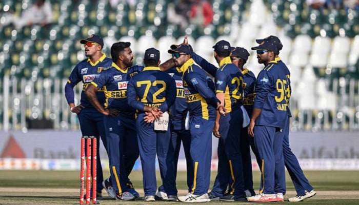Sri Lankas Asitha Fernando (2L) celebrates with teammates after taking the wicket of Pakistans Saim Ayub during the first one-day international (ODI) cricket match between Pakistan and Sri Lanka at the Rawalpindi Cricket Stadium in Rawalpindi on November 11, 2025.— Reuters