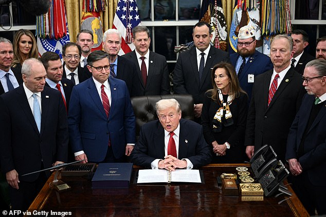 President Donald Trump speaks while signing the bill package to open the federal government in the Oval Office of the White House in Washington, DC, on November 12, 2025