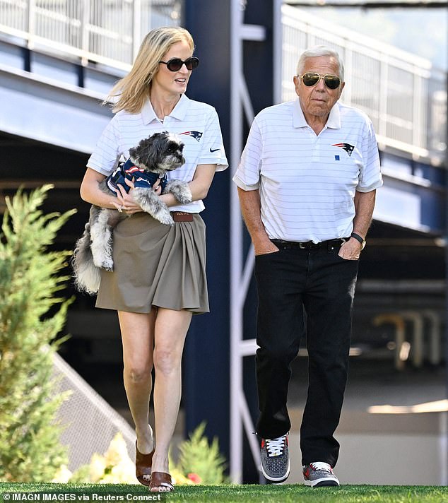 New England Patriots owner Robert Kraft and his wife Dr. Dana Blumberg bring their dog Heisman to training camp at Gillette Stadium back in July