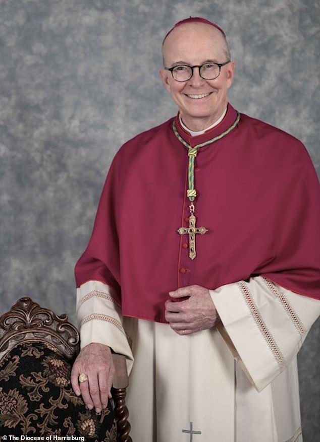 Harrisburg Bishop Timothy C Senior claimed the original float design approved by the school did not include the gate, and he was 'shocked and appalled' when he saw it on the float