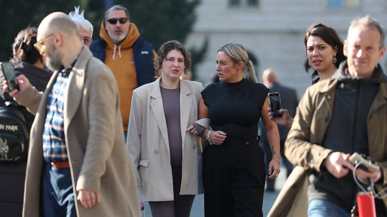 Bella Culley walks with her mother, Lyanne Kennedy, following her release. Pic: Reuters
