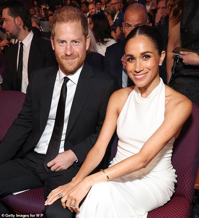 Prince Harry and Meghan Markle have sent a personalised quasi-royal letter to a celebrity psychic after posing for pictures with her last month (pictured in July 2024)