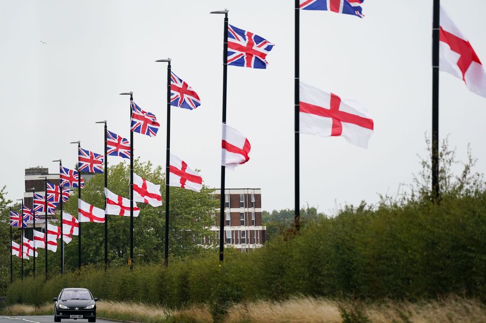 Flags raised on lampposts