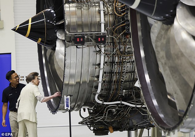 Princess Anne being shown a Rolls-Royce engine at the Airbus Asia Training Centre in Singapore this week