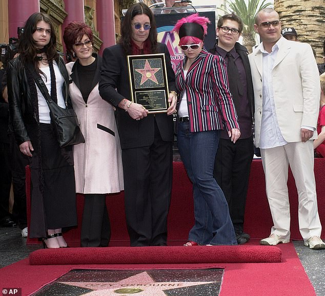 Over the course of his life, the Black Sabbath rocker had six children. The late singer poses with his family in 2002. Pictured from left, are Aimee, Sharon, Kelly, Jack and Louis