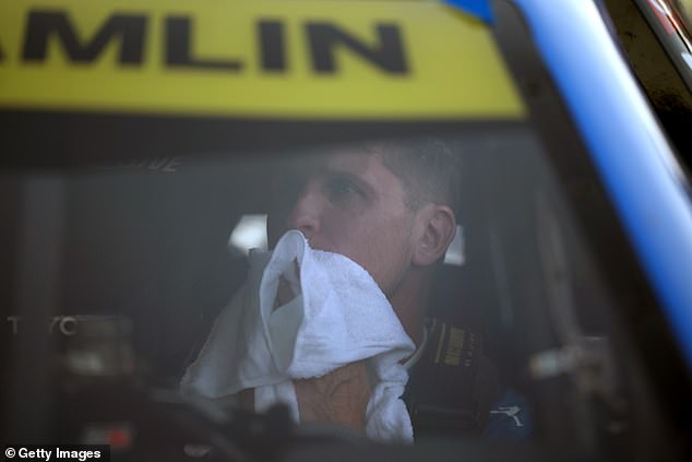 As Larson celebrated his second NASCAR Cup Series title, Hamlin sat in his car motionless for several seconds, then wiped his face with a white towel while remaining perfectly stoic