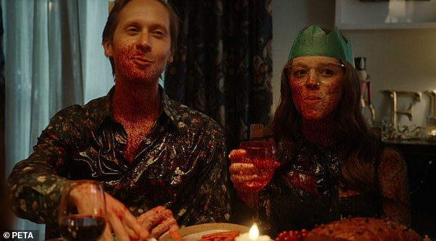The clip shows a family enjoying a Christmas meal, tucking into food and making conversation, before it becomes a bloodsoaked affair