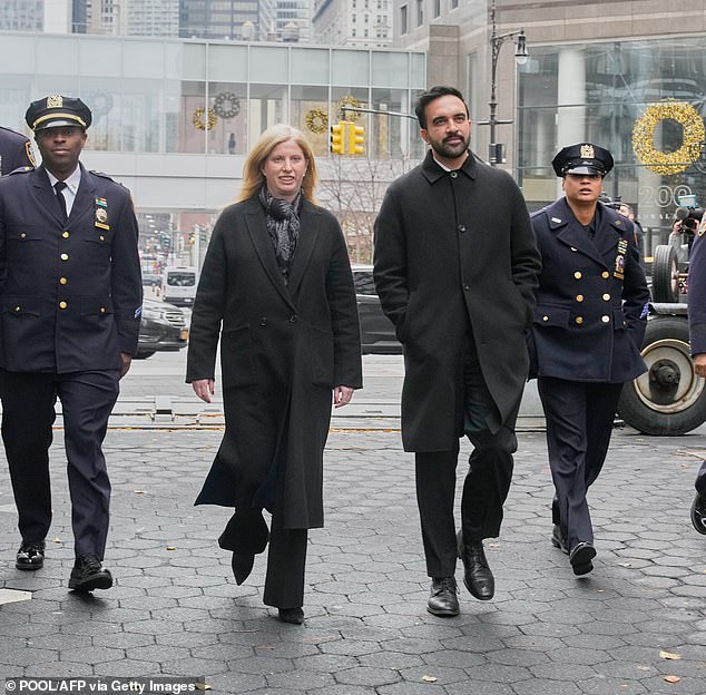 Zohran Mamdani and New York City Police Commissioner Jessica Tisch (left) walk to the New York City Police Memorial on November 19