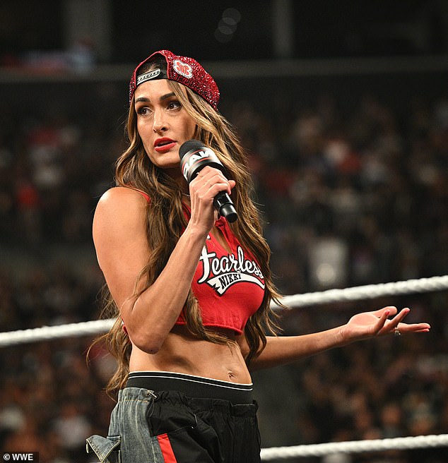 Nikki Bella was mocked with chants of 'Cena left you!' on Monday's episode of WWE Raw, which her ex-fiance John Cena also appeared on