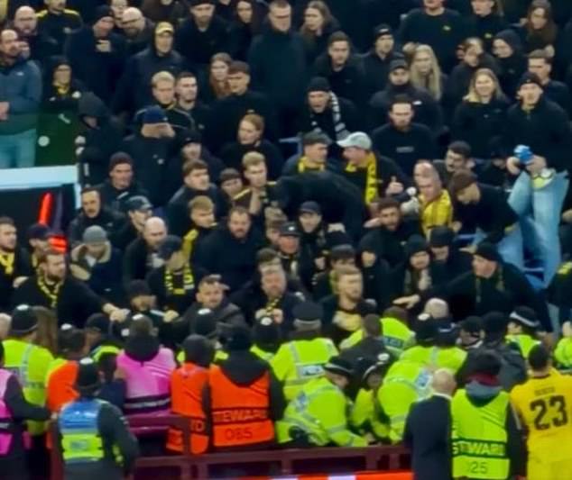 Travelling fans of Swiss side Young Boys threw punches at the police at Villa Park on Thursday