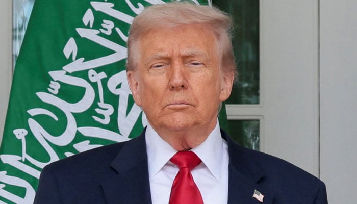 US President Donald Trump poses for picture at the White House in Washington, DC, US, November 18, 2025. — Reuters