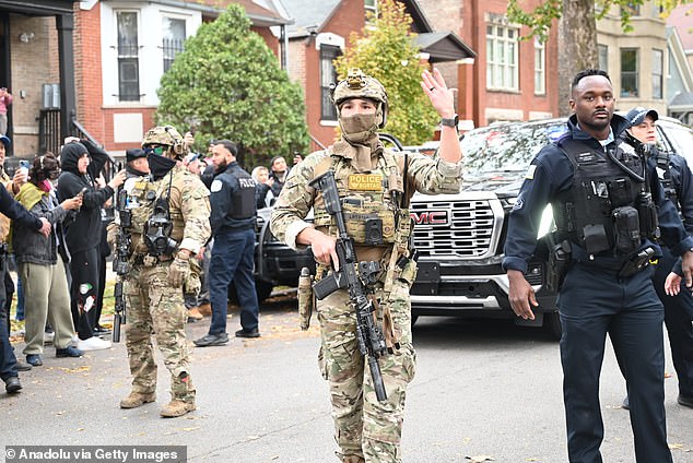 United States Immigration and Customs Enforcement (ICE) agents are seen conducting operations in Chicago
