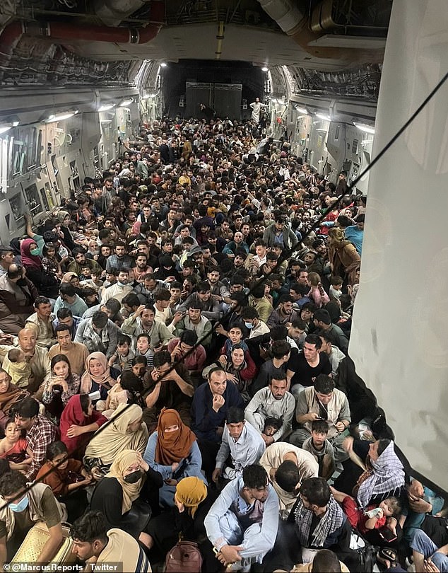 The photo Trump showed was of 640 Afghans being rescued from Kabul in August 2021 in a cargo jet that was designed to carry 150