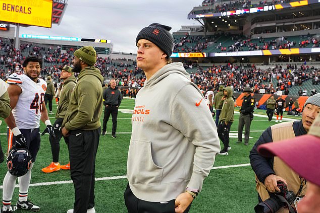 Joe Burrow stands on the field in Cincinnati following the Bengals' Week 9 loss to the Bears