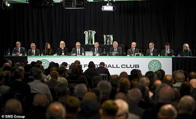 The club's senior figures take their seats at the top table before the rancorous scenes began