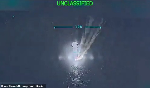 Commanders watched from a live drone feed as the boat went up in flames, but reportedly noticed two survivors clinging onto the debris in the water