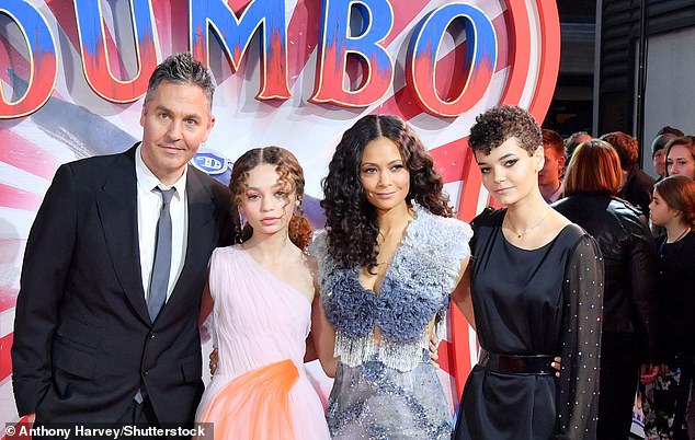 Nico and Ripley are pictured with mother Thandiwe and father Ol Parker in 2019