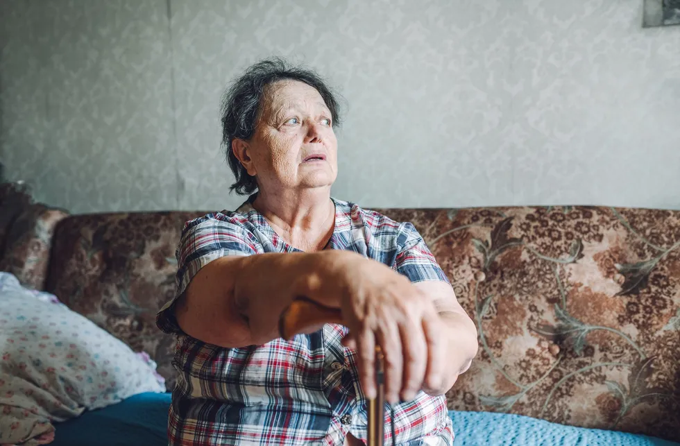 Female pensioner looking sad