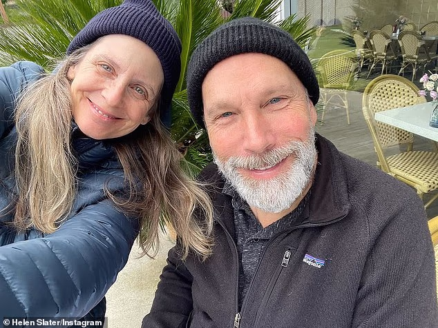 Slater has been married to Robert Watzke since 1989; (pictured)