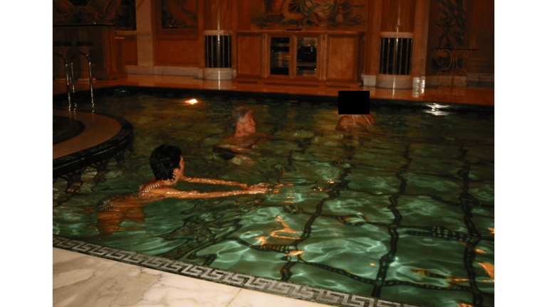 Bill Clinton in a pool with. Pic: US Department of Justice