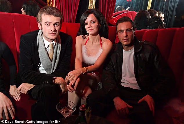 As well as inviting her fellow music artists, Lily also brought along Jonah Freud, with the two putting on a very cosy display, just a month after being spotted on a dinner date together (pictured Jonah, Lily and Marco Capaldo)