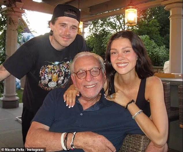 Nicola's parents Nelson (pictured) and Claudia are said to be 'excited' to have Brooklyn over the festive period (seen in July)