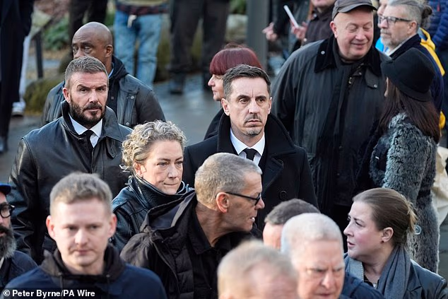 Ex-Manchester United stars David Beckham and Gary Neville were among mourners arriving