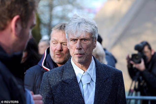 Mark Berry, known as Bez, a dancer with the Happy Mondays, was among today's mourners