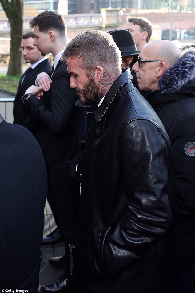 Sir David Beckham is seen entering Manchester Cathedral for Monday's ceremony