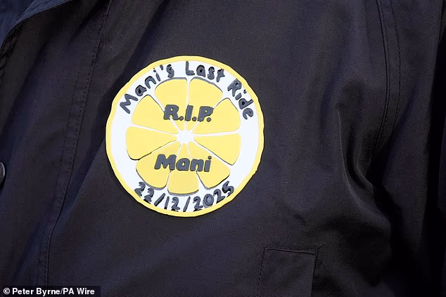 This badge paying tribute to Mani was worn by one mourner