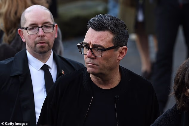 Greater Manchester mayor Andy Burnham was among the mourners at Mani's funeral