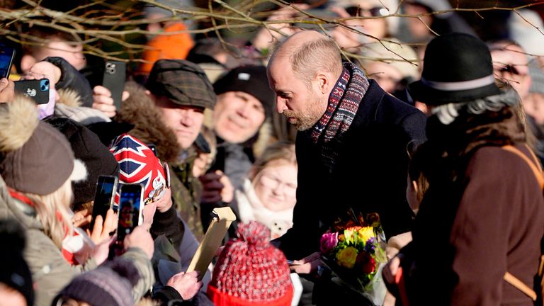 The Prince of Wales speaking to members of the public outside St Mary Magdalene Church in Sandringham.
Pic: Aaron Chown/PA