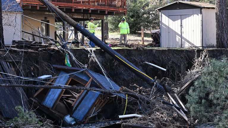 Storm damage in Wrightwood, California. Pic: AP/William Liang