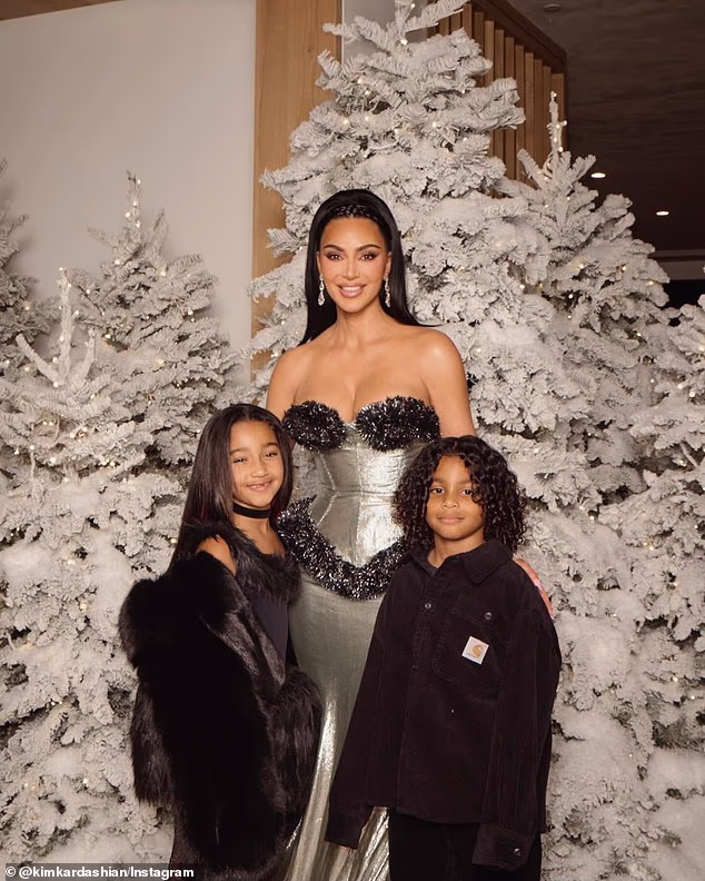 The star also took an adorable image with her daughter Chicago and son Psalm near her massive Christmas tree decor