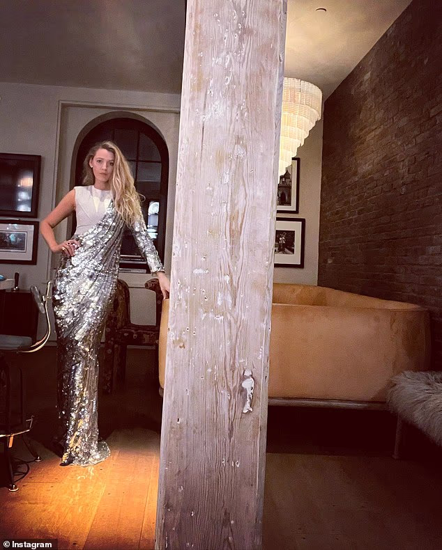 Lively showed off a glam holiday look in a slinky silver gown