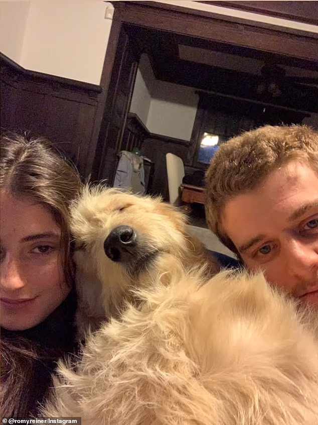 Romy is pictured with her dog, Billie, and Silberberg