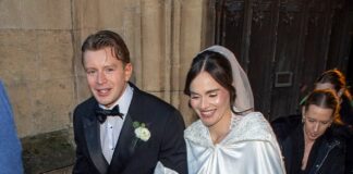 Holly Ramsay looked radiant in her billowing ivory gown… but as the wedding party was buffeted by the freezing wind, an even icier text was winging its way to her groom Adam Peaty