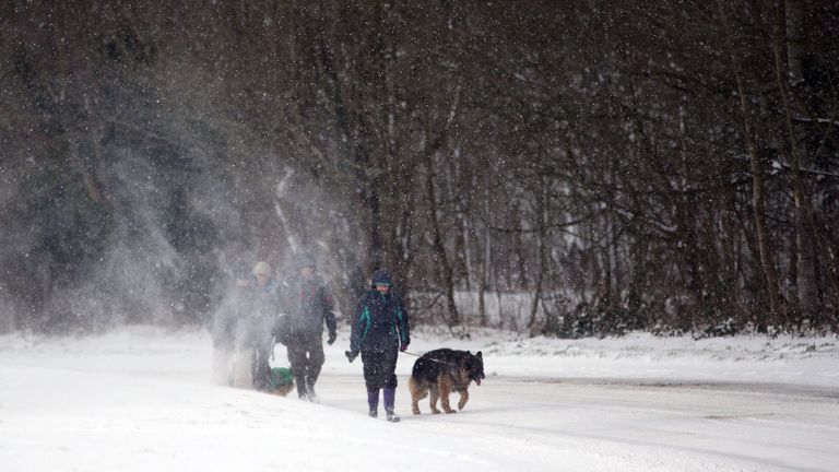 People walk in the snow near Botley, West Sussex. File pic: Steve Parsons/PA