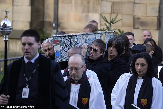 Gary 'Mani' Mounfield's coffin was carried out today by pallbearers including former Stone Rosees bandmates Alan 'Reni' Wren (left) and John Squire (right) plus Liam Gallagher (centre)