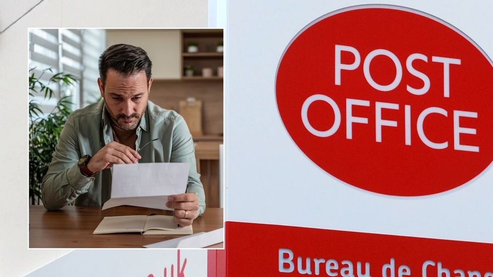 Post Office and man looking at letter
